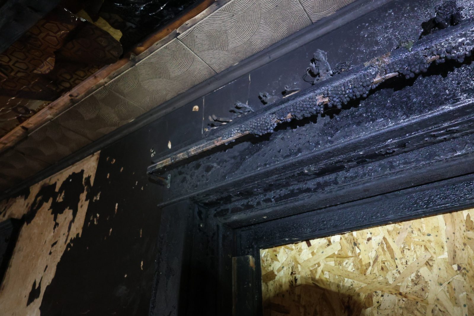 Charred ceiling after a structure fire in Reading, PA