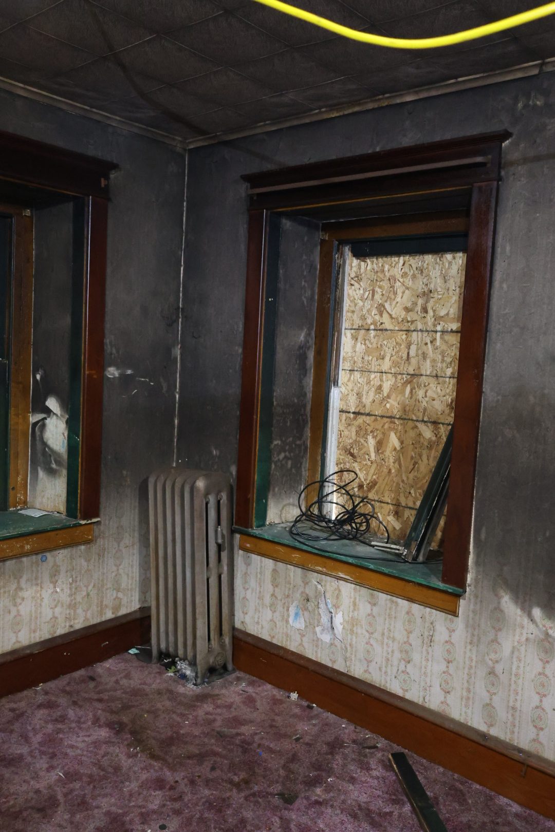 Boarded window after fire damage in Sinking Spring, PA