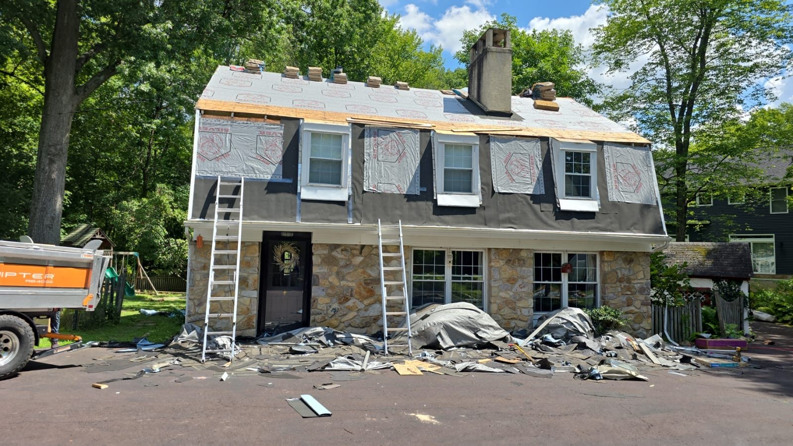 Siding installation on a two-story home in New Holland, PA