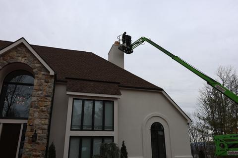 Boom lift roof work stucco home — Sinking Spring, PA