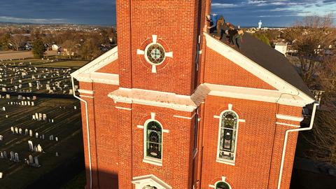 Brick building cupola new shingles closeup — New Holland, PA