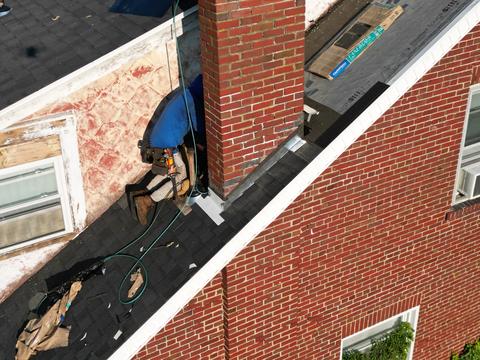 Brick home roof edge installation worker — Shillington, PA
