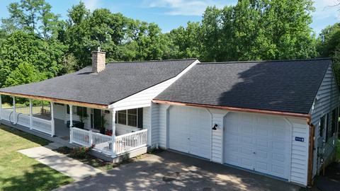Drone home roof among trees — Mohnton, PA