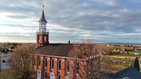Drone view church building completed roof — New Holland, PA