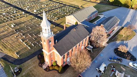 Drone view church building town aerial — New Holland, PA
