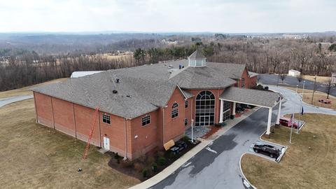 Drone view commercial building roof brick — Lebanon, PA