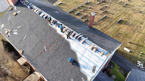 Drone view commercial low slope roof crew — New Holland, PA