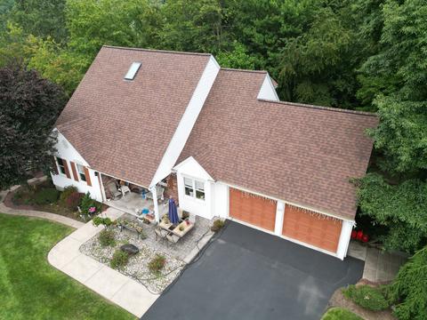 Drone view roof replacement brick home — Mohnton, PA