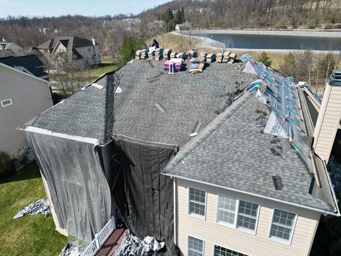 Drone view roof replacement work in progress — West Chester, PA