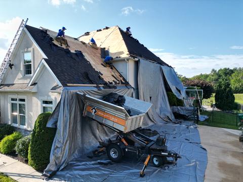 Drone view roof tear off crew debris — Lebanon, PA