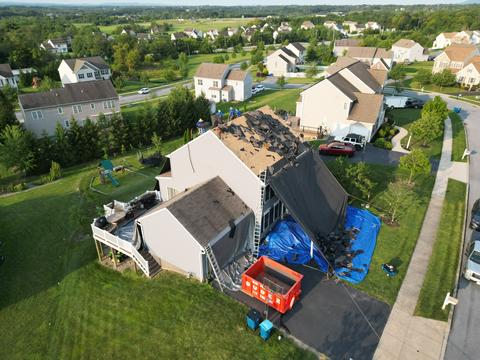 Drone view storm damage roof tarp — Lebanon, PA