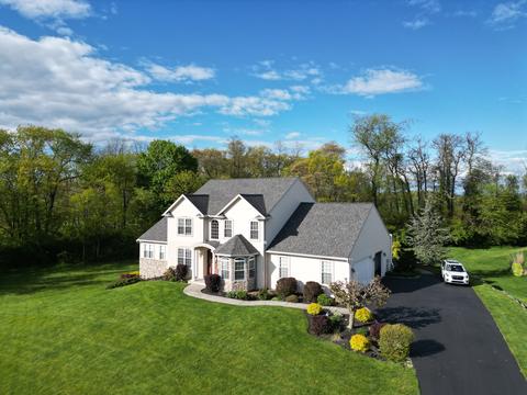Drone view white home new roof — Fleetwood, PA