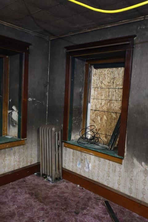 Fire damage interior boarded window — Sinking Spring, PA