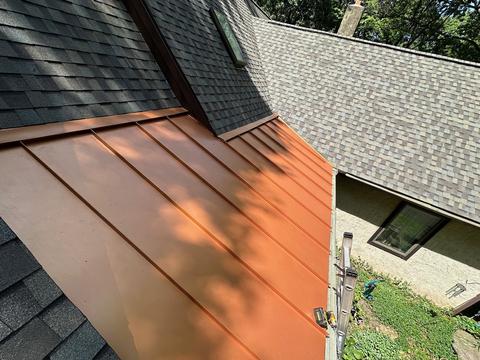 Red standing seam metal roof detail — Mohnton, PA
