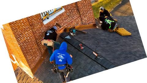 Roofing crew installing shingles brick home — New Holland, PA