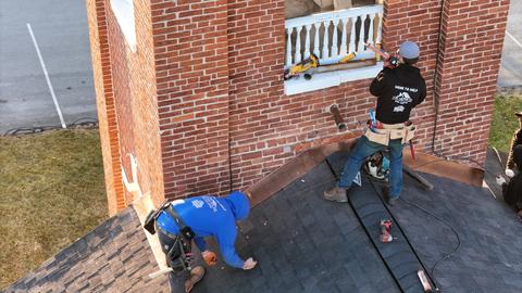Roofing crew roof ridge installation — New Holland, PA