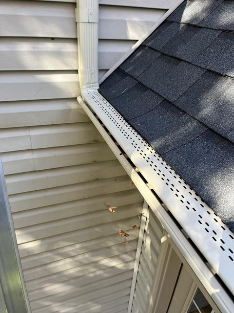 Seamless gutter downspout white home — Mohnton, PA