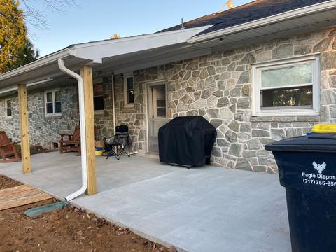 Stone home covered porch exterior — Mohnton, PA