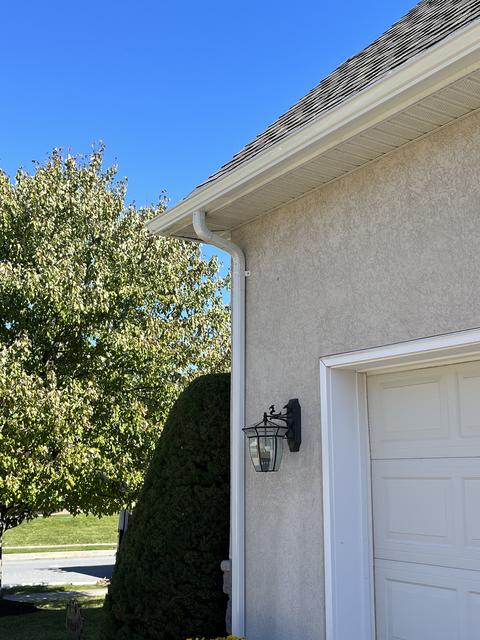 Stucco home gutter downspout detail — Mohnton, PA