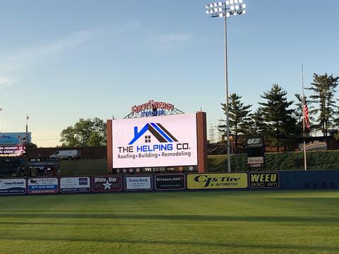 The Helping Co. ballpark banner advertising