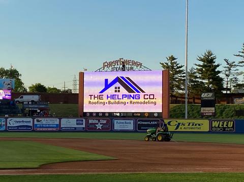 The Helping Co. ballpark banner advertising