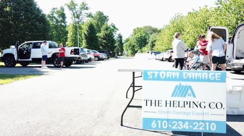 The Helping Co. ballpark tent community event