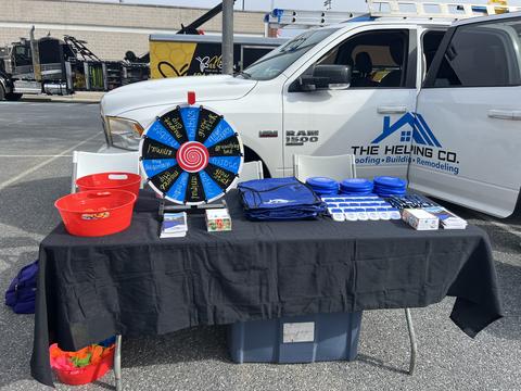 The Helping Co. event booth display