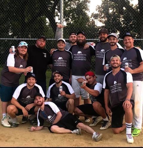 The Helping Co. roofing crew team photo