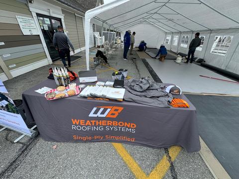 The Helping Co. trade show booth