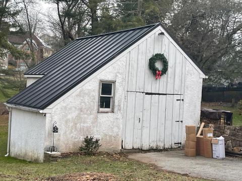 White outbuilding standing seam metal roof — Phoenixville, PA