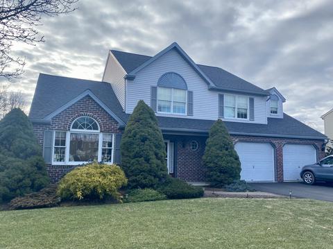 White two story home exterior new roof — Wyomissing, PA
